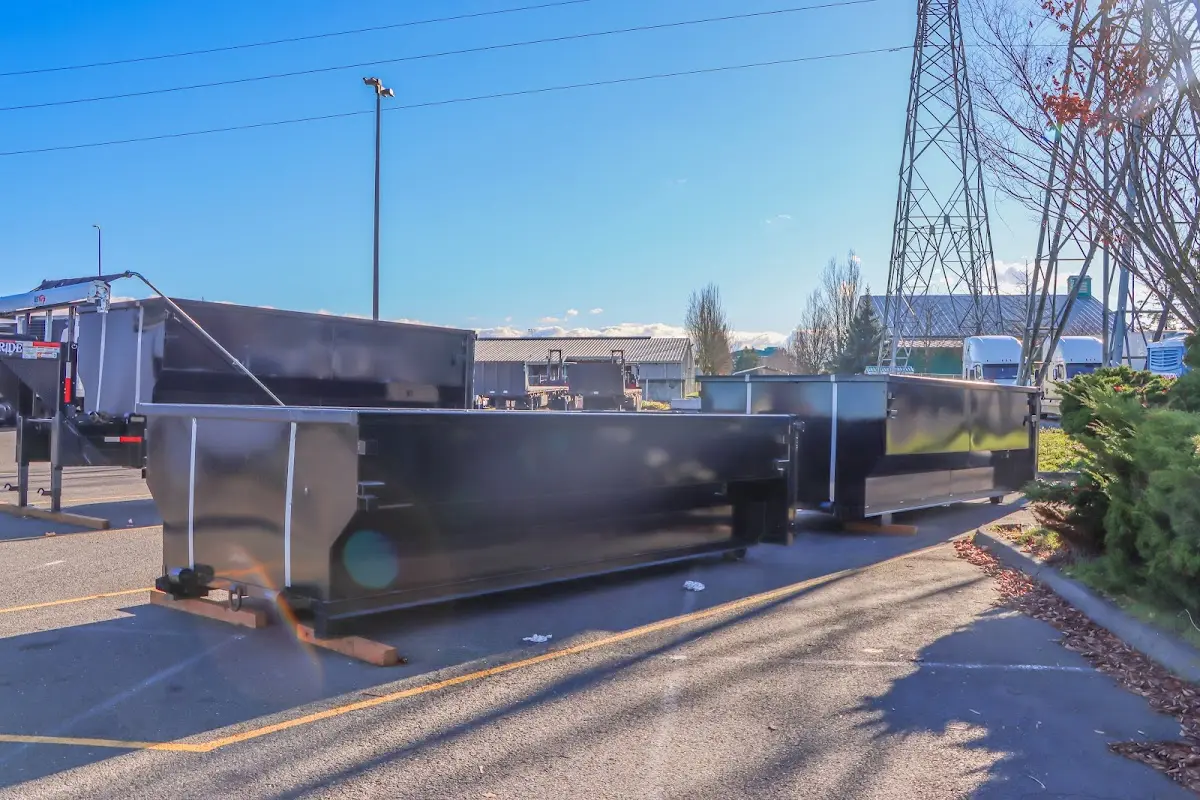 Roll-off dumpster ready for waste disposal at job site for 2 Yard Dumpster Rental in Idaho Falls